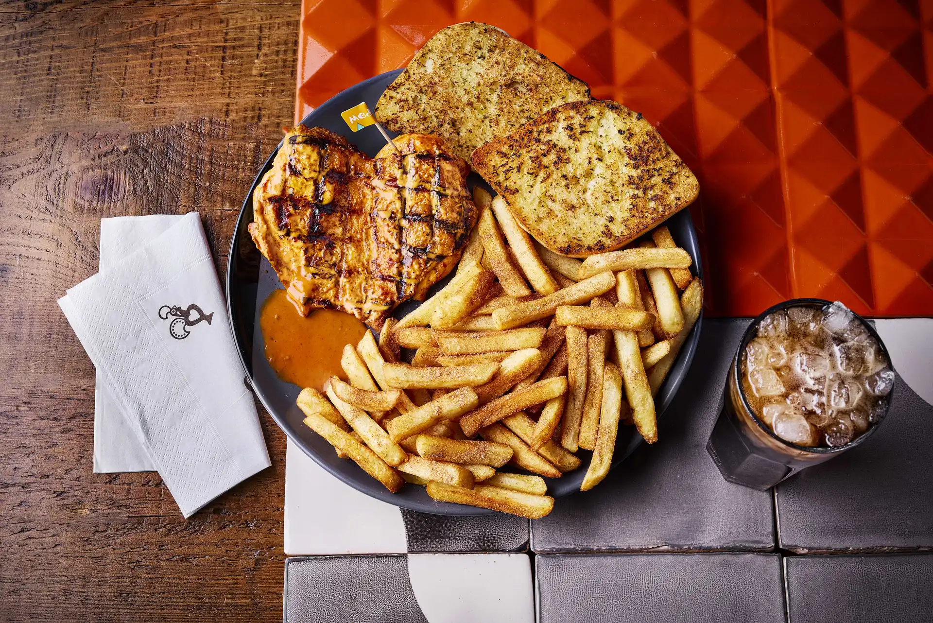 Nando's Chicken Butterfly with PERi-Salted Chips, Garlic Bread and Bottomless Coke Zero